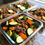Sheet Pan Ground Beef and Veggie Bliss with roasted carrots, zucchini, broccoli, and seasoned ground beef