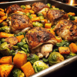 Sheet Pan Sweet Potato Chicken Thighs with roasted Brussels sprouts and golden sweet potato cubes