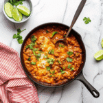 Mexican Keto Ground Beef Casserole with melted cheddar cheese and fresh cilantro on top