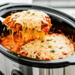 Crock Pot Million Dollar Spaghetti with creamy cheese and meat sauce in a slow cooker