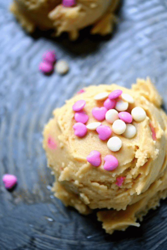 Valentine Day Cookies Recipe with pastel pink cookies and colorful heart decorations