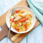 Instant Pot Chicken Scampi with tender chicken strips, colorful bell peppers, and creamy garlic Parmesan sauce served over pasta.