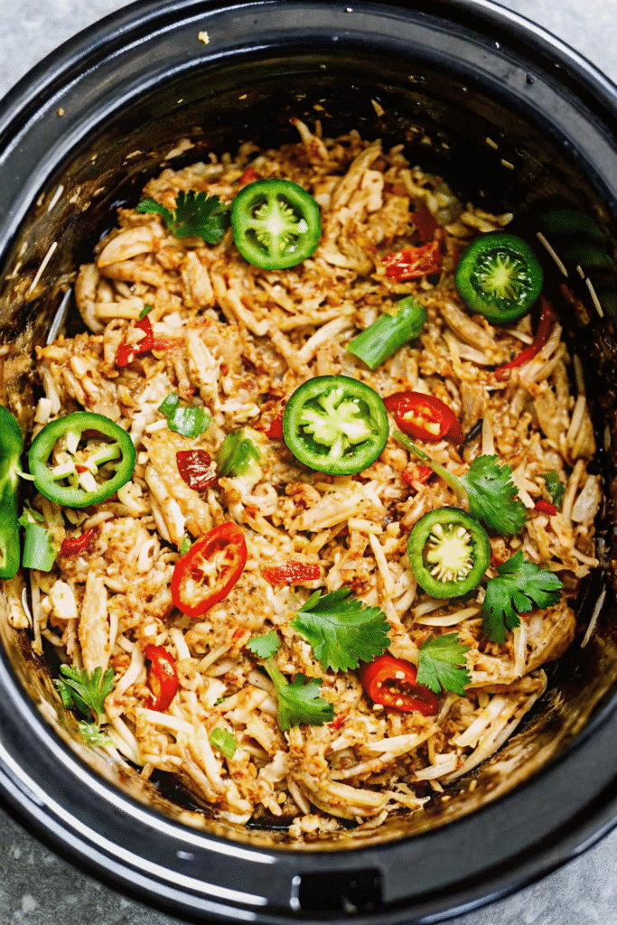 Easy Crock Pot Salsa Chicken Recipe in 5 Min 3 Slow cooker Crock Pot Salsa Chicken with melted spices and shredded chicken
