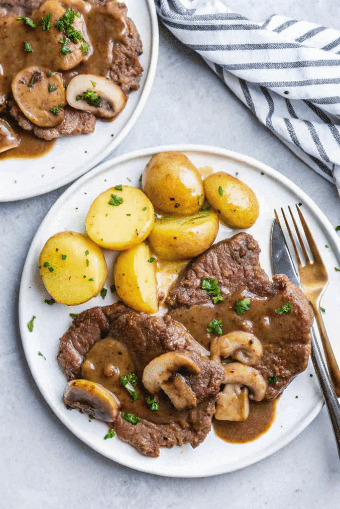One-pot Instant Pot Cube Steak dinner with vegetables and rich beef gravy