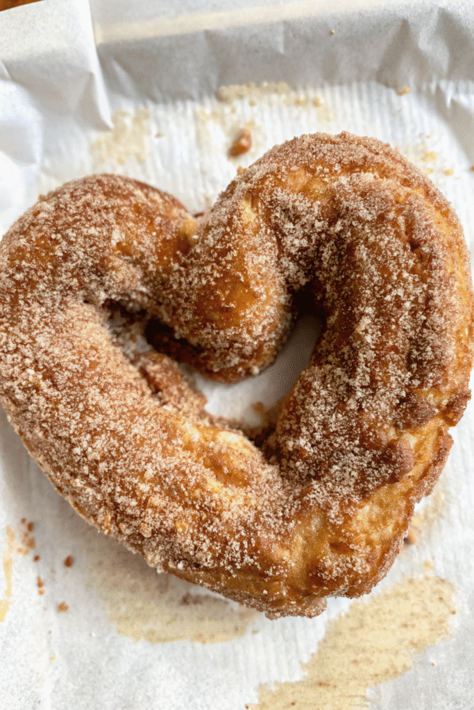 Freshly baked Valentine Cinnamon Sugar Pretzels brushed with butter and rolled in cinnamon sugar.