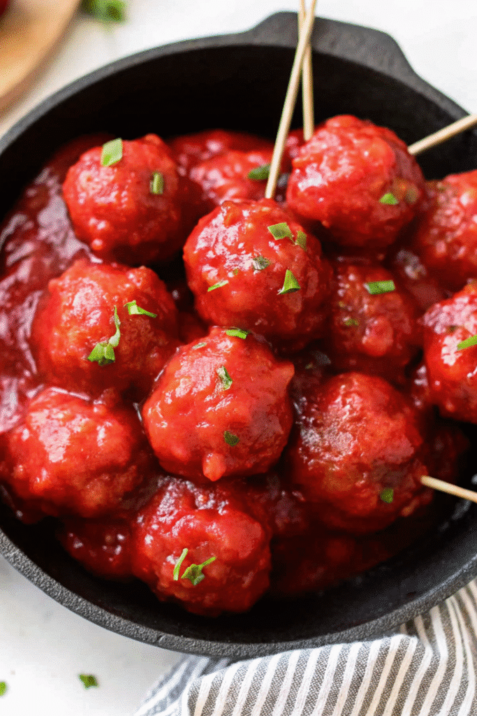 Homemade Cranberry Sauce Meatballs served warm in a thick cranberry glaze