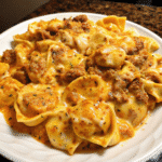 Cajun Garlic Beef Tortellini in a creamy Parmesan sauce with seasoned ground beef and herbs