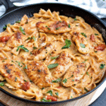 Creamy Velveeta Marry Me Chicken Pasta served with tender chicken, sun-dried tomatoes, and fettuccine in a rich garlic Parmesan cream sauce.