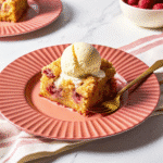 Moist Rhubarb Cake with crumbly cinnamon streusel topping in a 9x13-inch baking dish