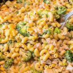 Creamy Cheesy Chicken Broccoli Mac served in a bowl with tender chicken, elbow pasta, broccoli florets, and melted Colby Jack cheese.