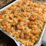Homemade Seafood Mac and Cheese baked with shrimp, crawfish, and melted cheese in a creamy sauce
