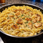 Cheesy Ranch Chicken and Noodles Skillet with creamy sauce, tender chicken pieces, and egg noodles in a pan