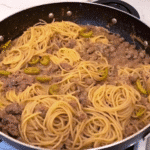 Cheesy Beef Angel Hair Spaghetti with seasoned ground beef and pepperoncini peppers in a savory sauce