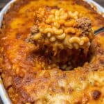 Cheesy Mac And Cheese Lasagna baked with layers of creamy macaroni, meat sauce, and melted mozzarella and cheddar cheese
